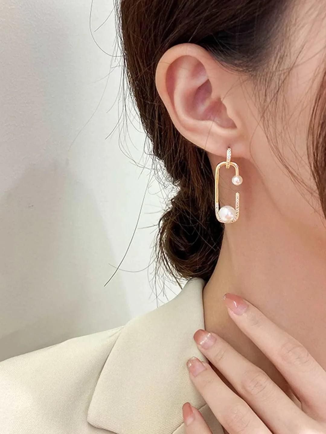 Gold Tone Pin Shaped Pearl Studded Glitzy Drop Earrings - SayToLove
